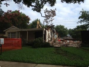 Another shot of our excavator tearing down a house in Preston Hollow.